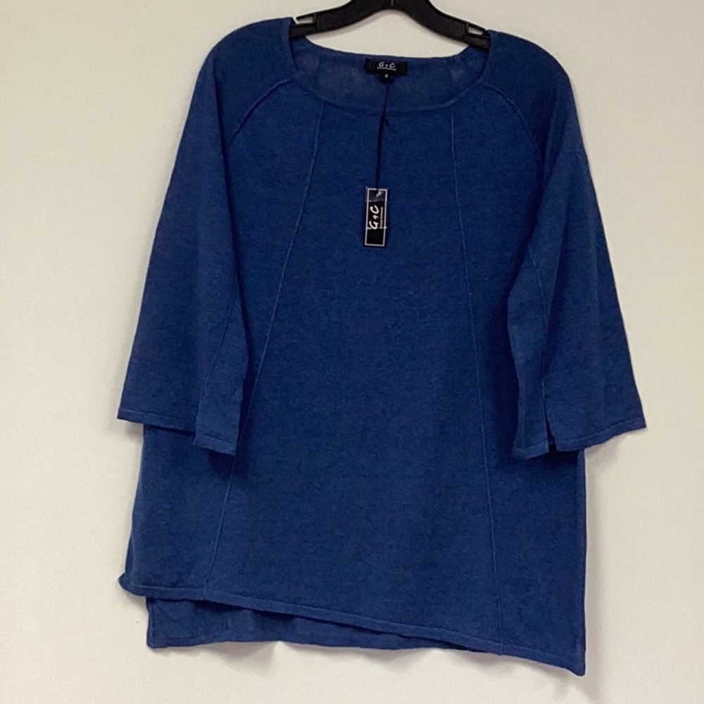 Beautiful high low crew neck with seam details on front & sleeves